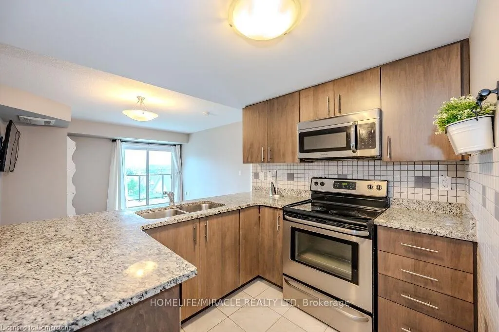Photo 10 of Unit 413, 50 Bryan Court, Kitchener, Grand River South — HOMEH