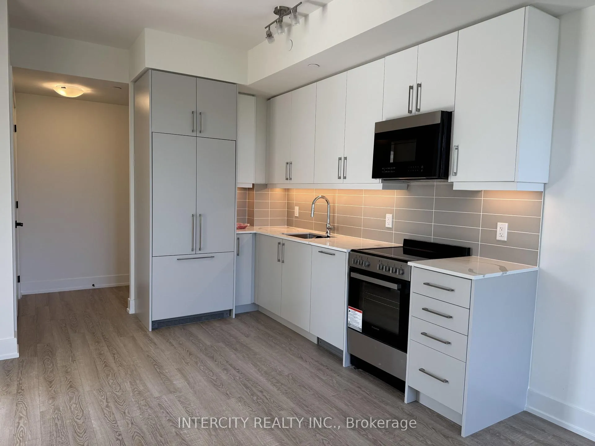 Photo 4 of Unit 318, 2075 King Road, King, King City — HOMEH