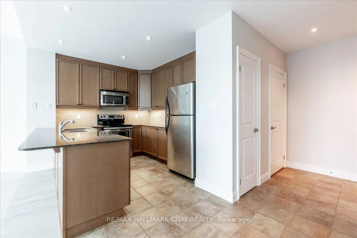 Photo 11 of Unit PH-09, 33 Ellen Street, Barrie, Lakeshore — HOMEH