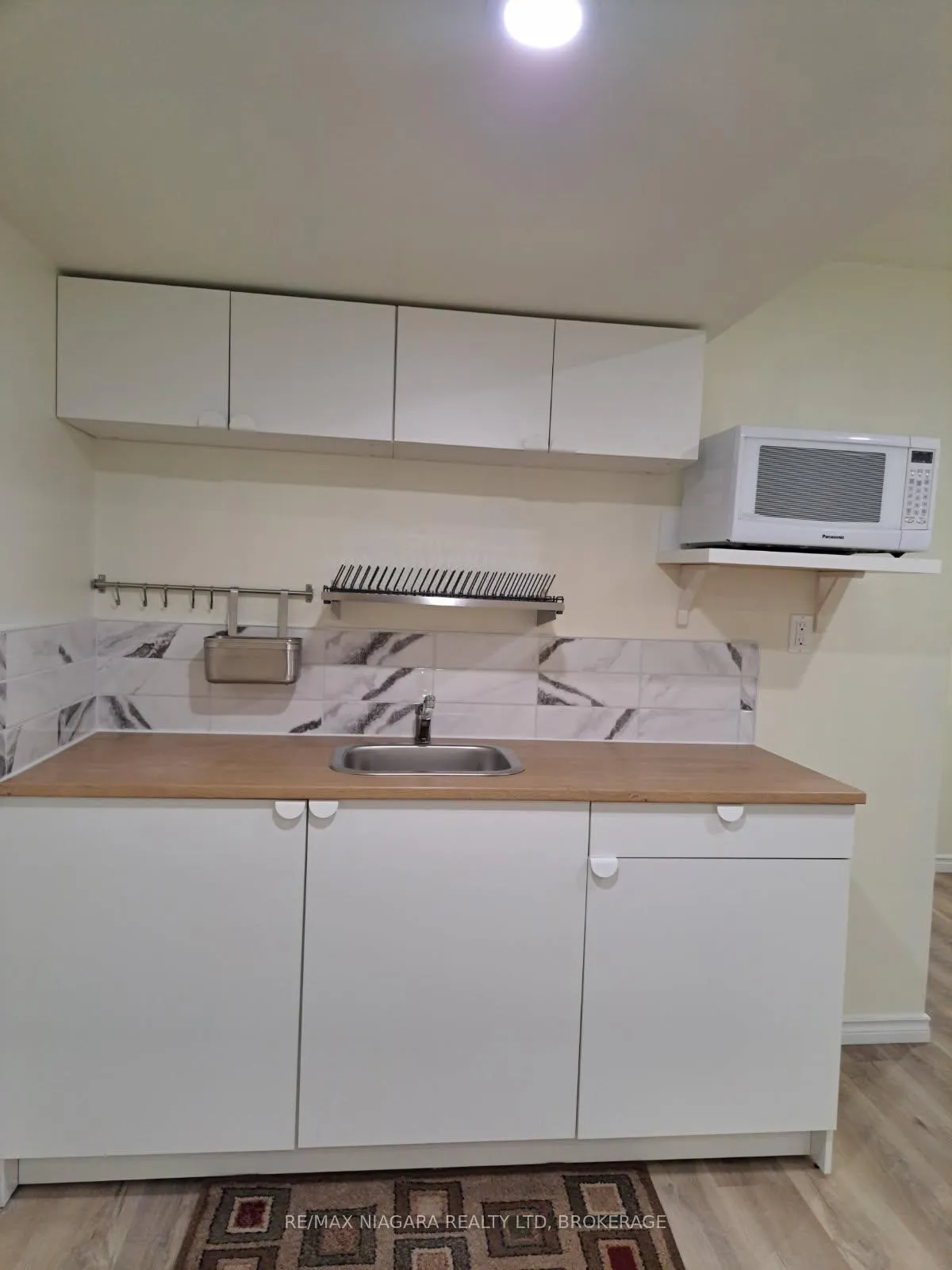 Photo 4 of Unit 3 Lower, 5595 Drummond Rd, Niagara Falls, Hospital — HOMEH