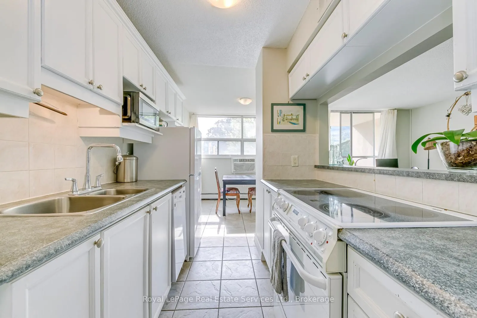 Photo 5 of Unit 204, 1950 Main Street W, Hamilton, Ainslie Wood — HOMEH