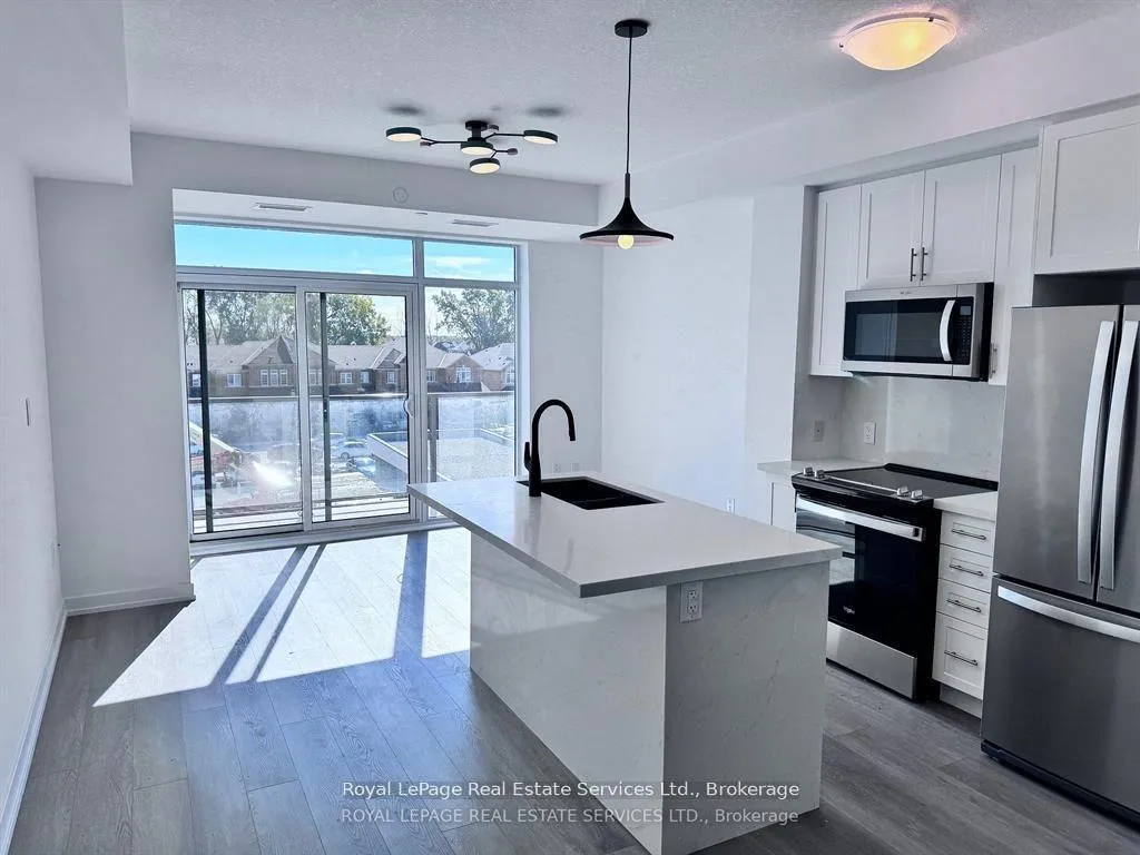 Photo 10 of Unit 317, 460 Dundas Street E, Hamilton, Waterdown — HOMEH