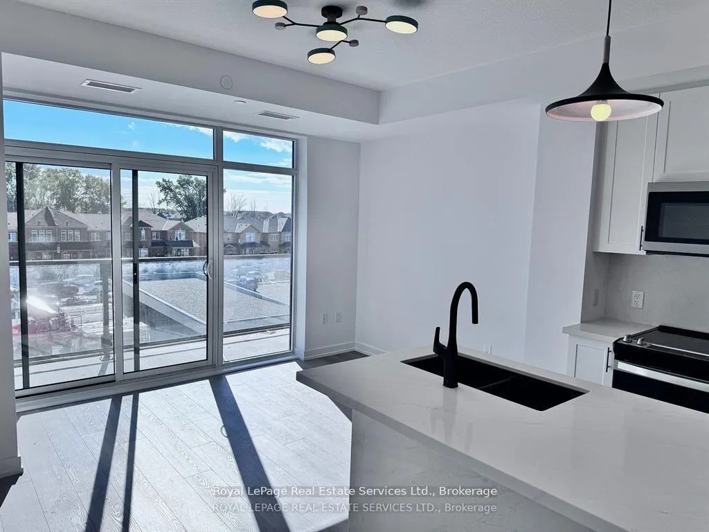 Photo 11 of Unit 317, 460 Dundas Street E, Hamilton, Waterdown — HOMEH