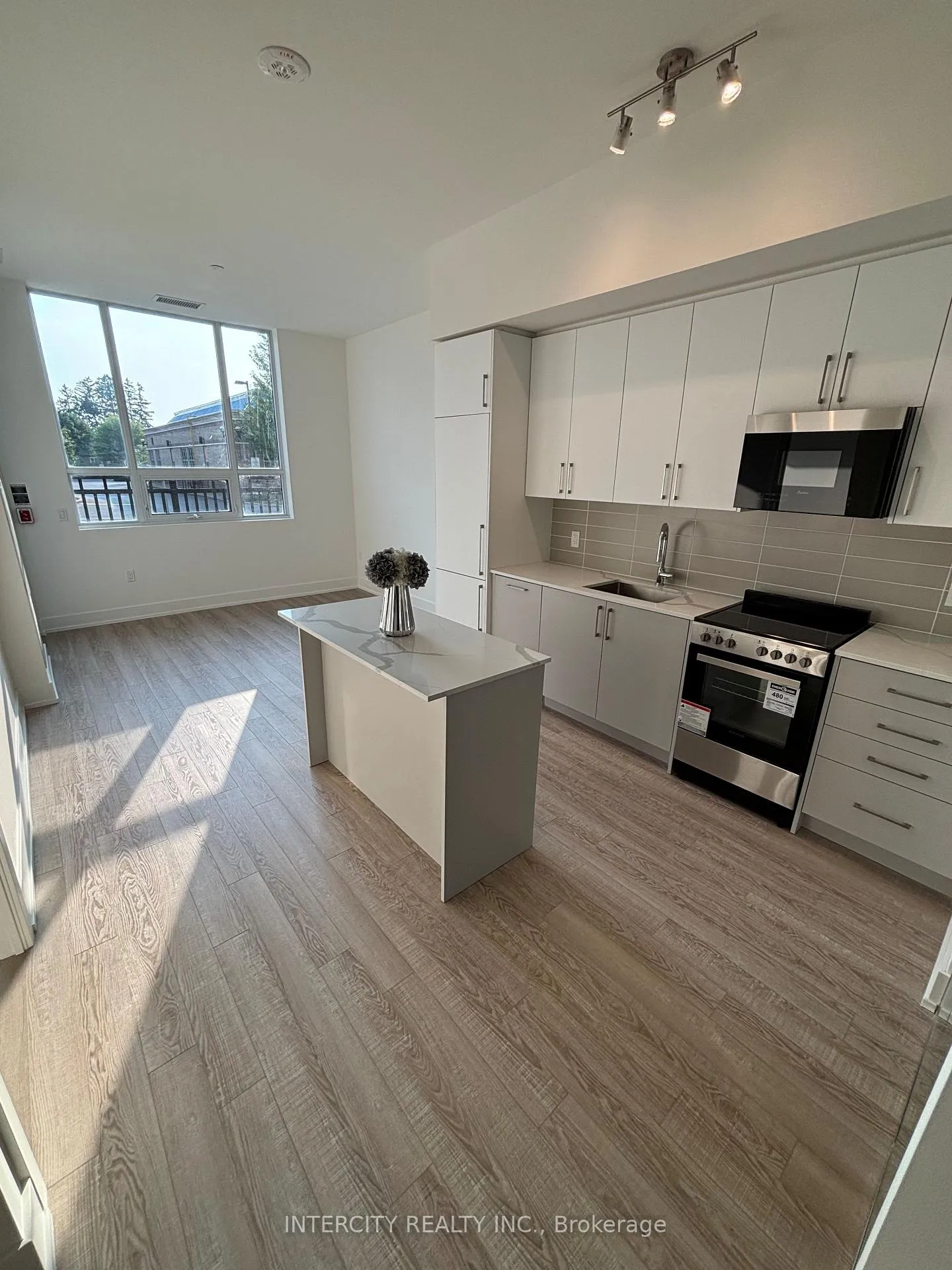 Photo 1 of Unit 116, 2075 King Road, King, King City — HOMEH