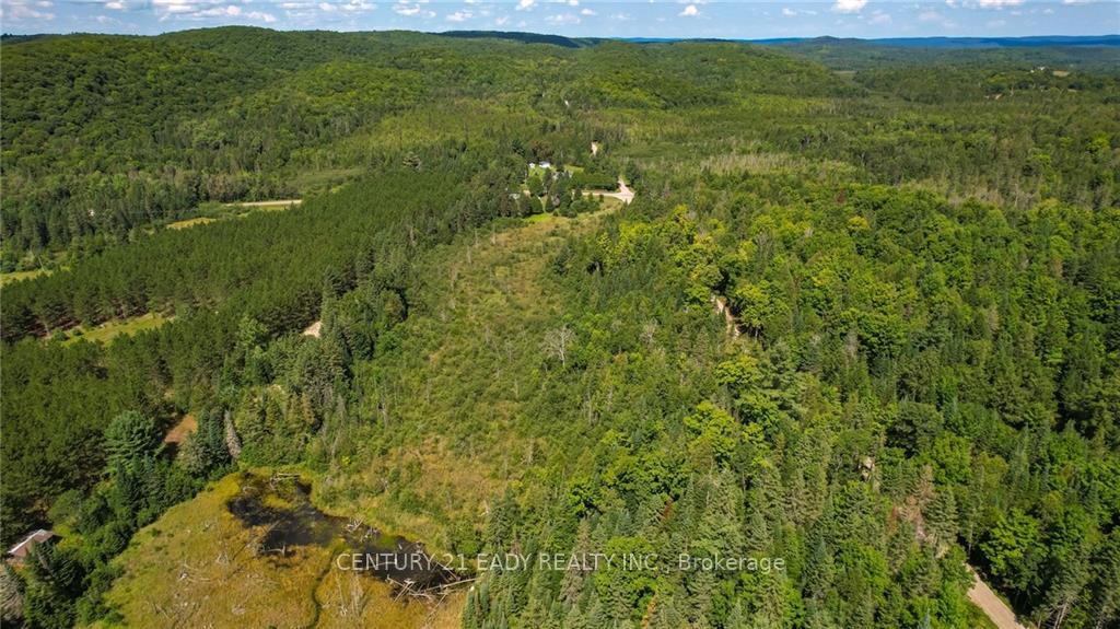 Photo 5 of 1996 Matawatchan Road, Frontenac, Frontenac North — HOMEH