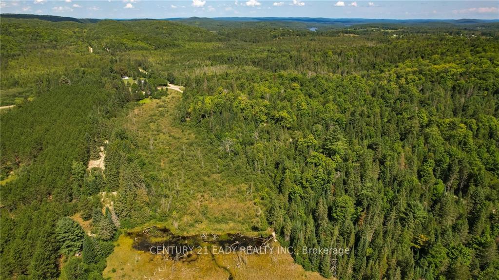 Photo 6 of 1996 Matawatchan Road, Frontenac, Frontenac North — HOMEH