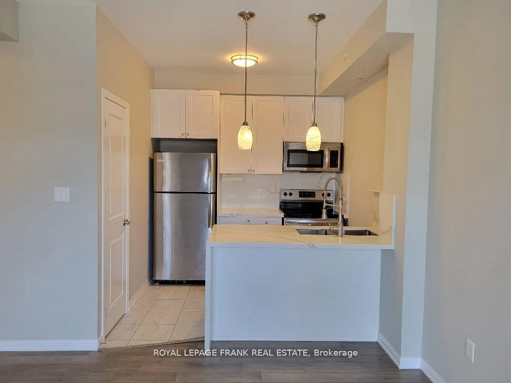 Photo 2 of Unit 303, 80 Aspen Springs Drive, Clarington, Bowmanville — HOMEH
