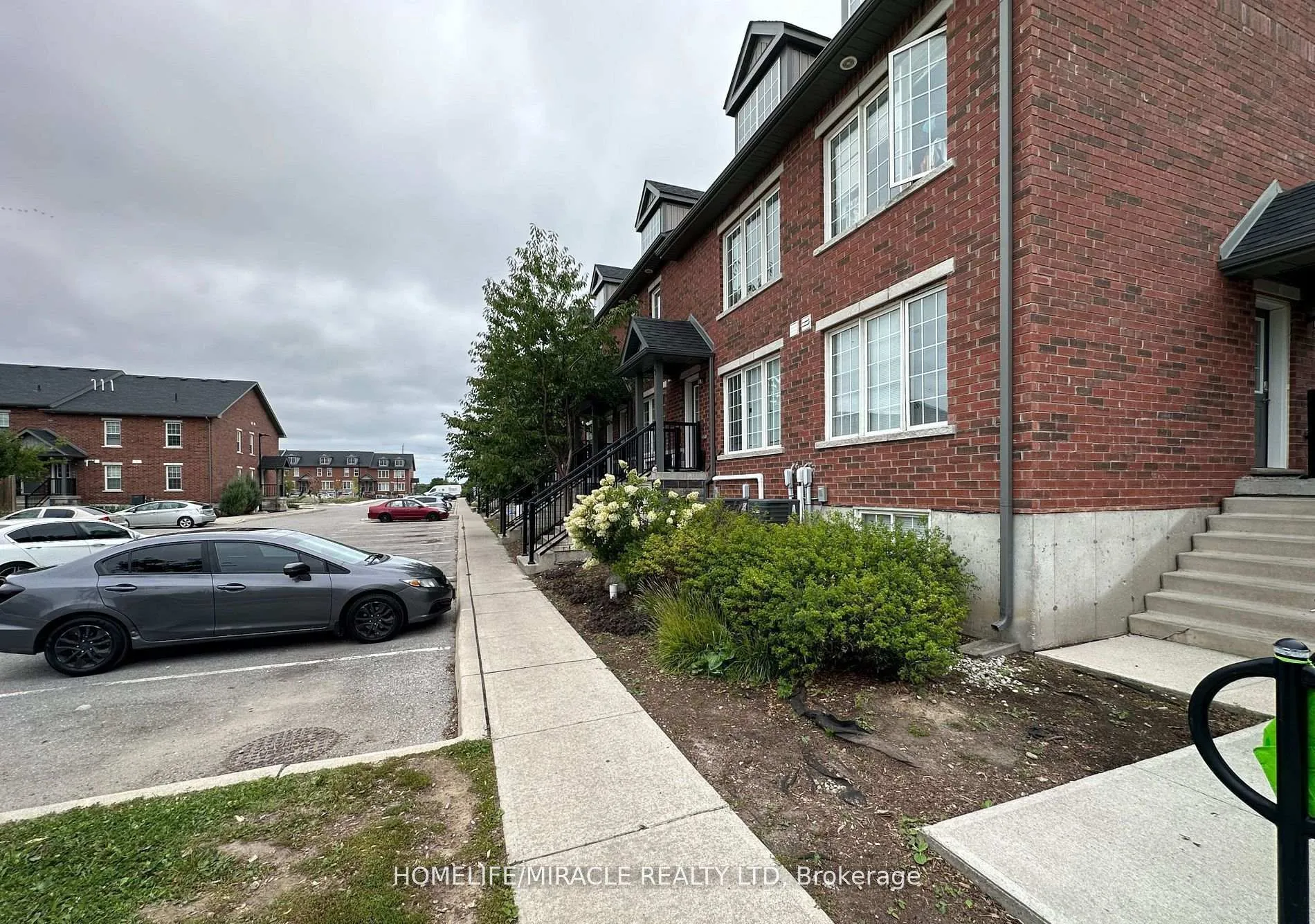 Photo 2 of Unit 8, 244 Penetanguishene Road, Barrie, Georgian Drive — HOMEH