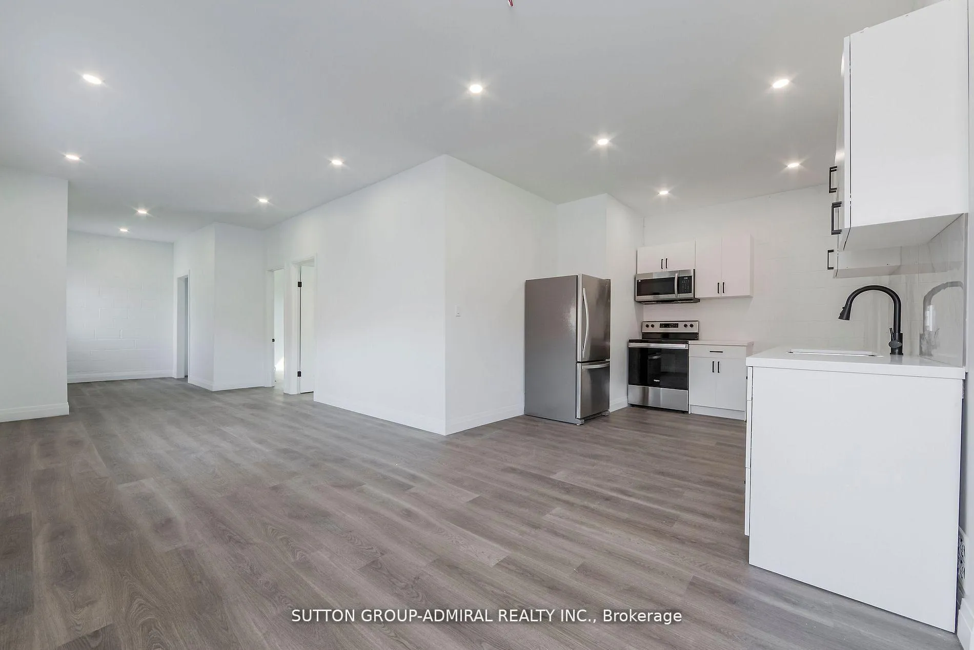 Photo 1 of Unit Main Fl, 1930 Queen Street E, Toronto, The Beaches — HOMEH