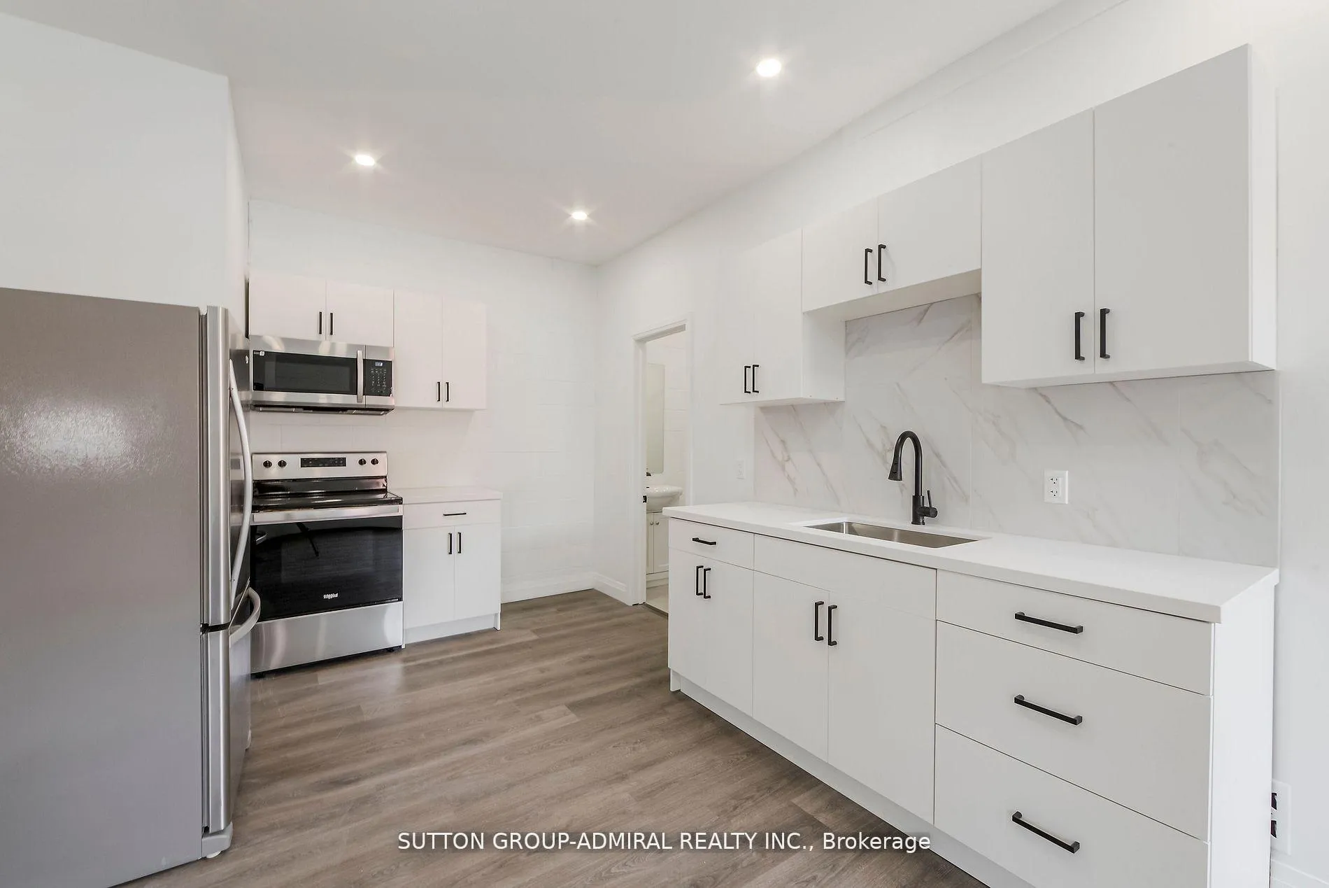Photo 10 of Unit Main Fl, 1930 Queen Street E, Toronto, The Beaches — HOMEH