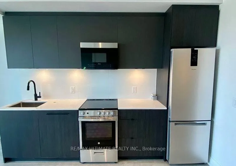Photo 3 of Unit 409, 2369 Danforth Avenue, Toronto, East End-Danforth — HOMEH