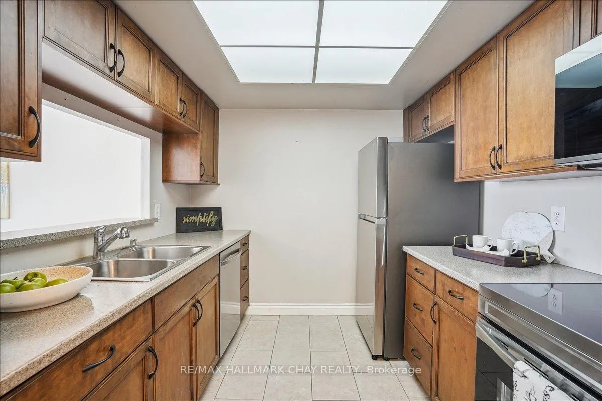 Photo 11 of Unit 809, 65 Ellen Street, Barrie, Lakeshore — HOMEH