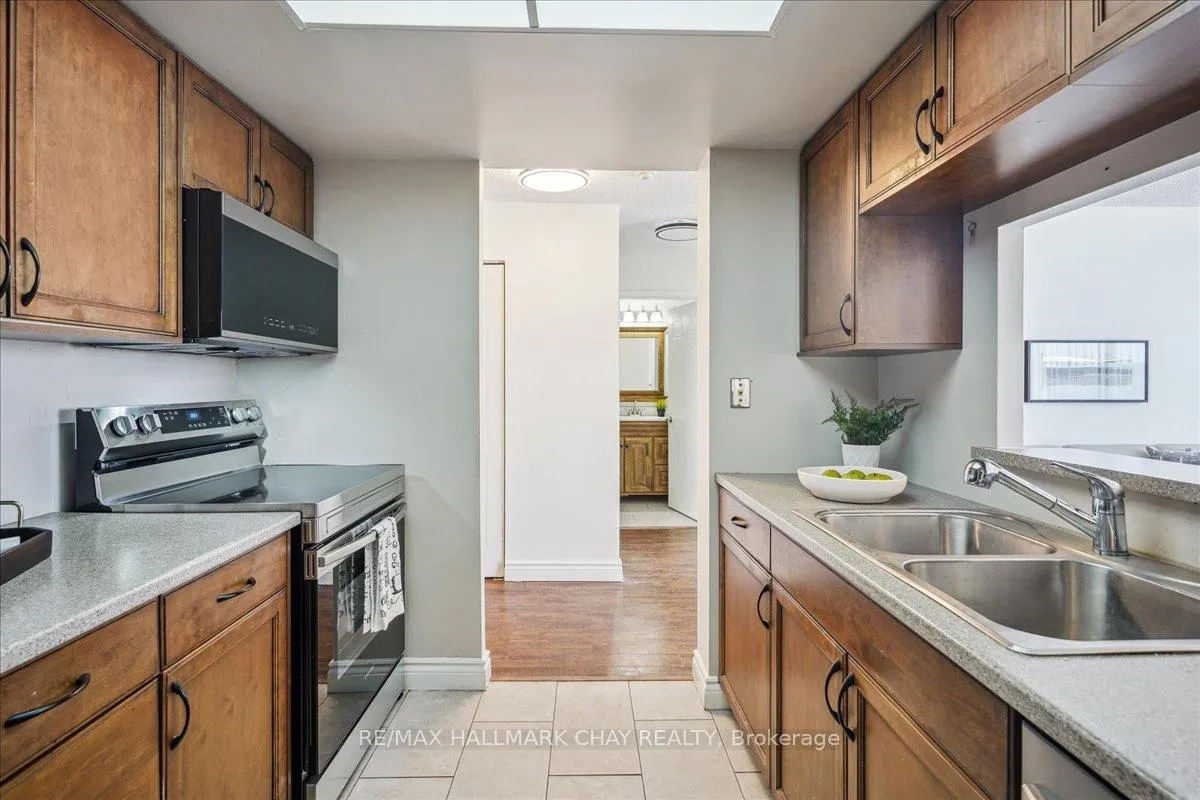 Photo 12 of Unit 809, 65 Ellen Street, Barrie, Lakeshore — HOMEH