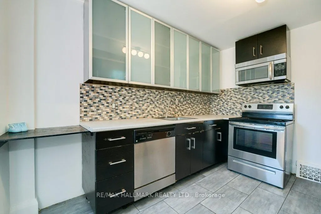 Photo 11 of 935 Kingston Road, Toronto, The Beaches — HOMEH
