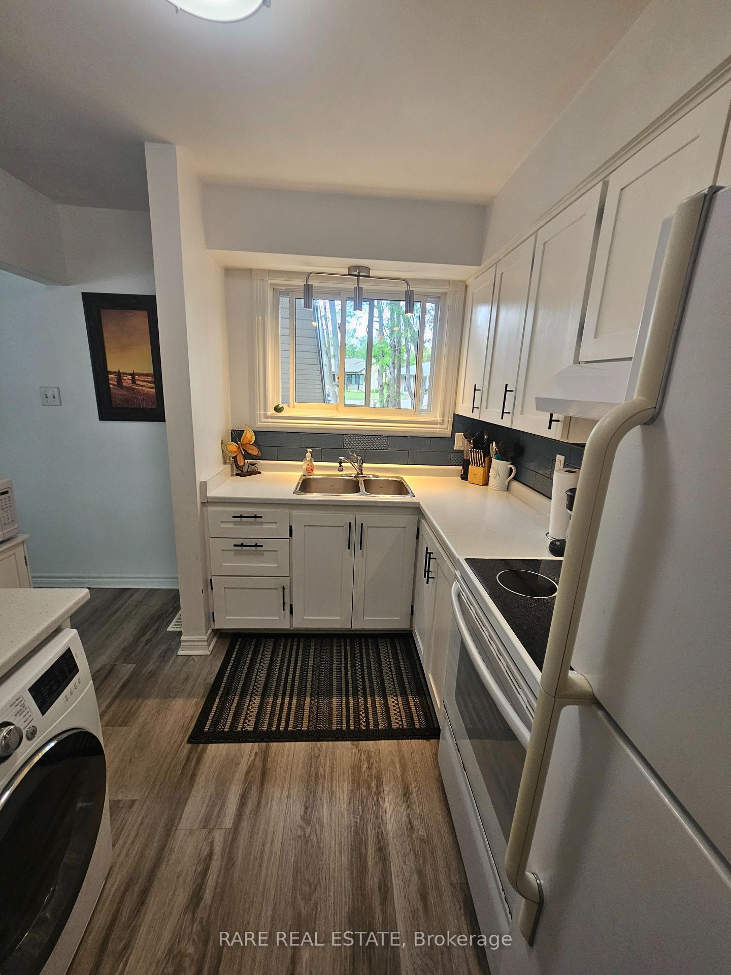 Photo 16 of Unit MAIN, 19 Howard Crescent, Barrie, Wellington — HOMEH