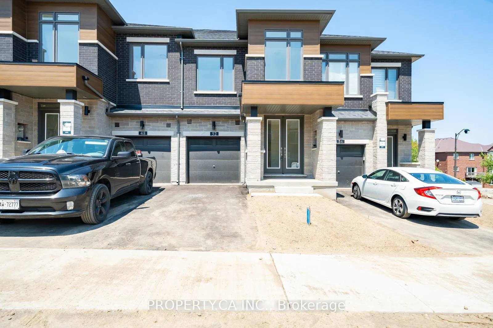 Front of Unit TH20-03, 52 Rumi Court