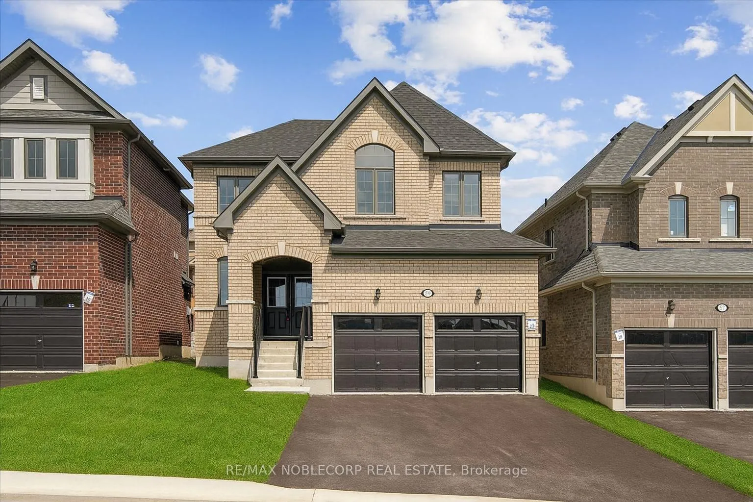 Front of 59 Lawrence D. Pridham Avenue