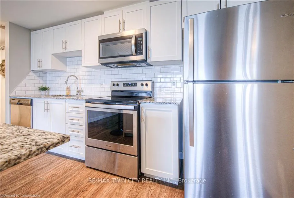 Photo 10 of Unit 406, 175 Commonwealth Street, Kitchener — HOMEH