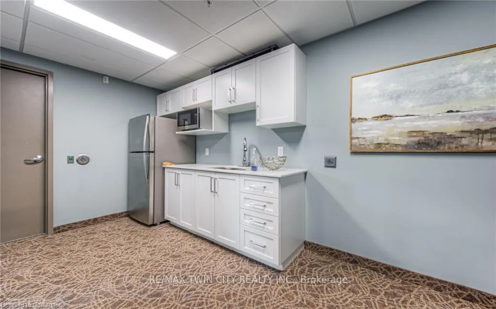 Photo 26 of Unit 406, 175 Commonwealth Street, Kitchener — HOMEH