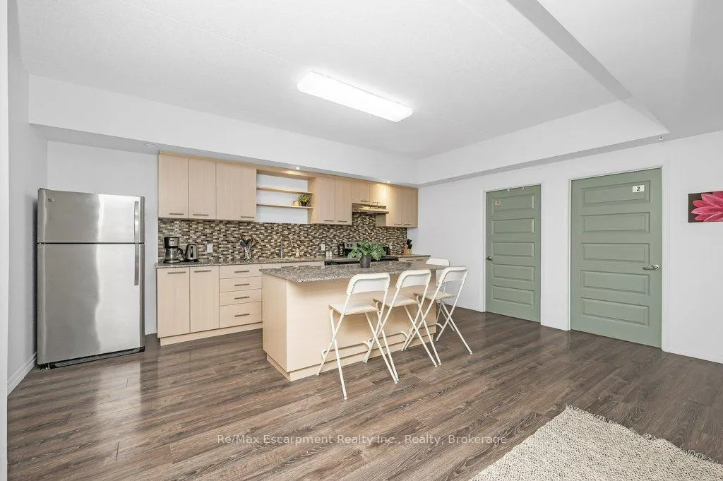 Photo 3 of Unit 502, 8 Hickory Street W, Waterloo — HOMEH
