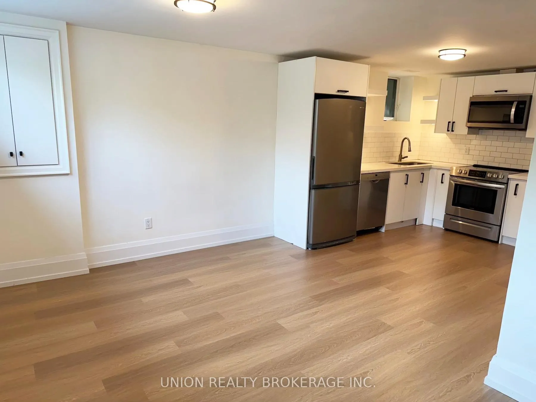 Photo 4 of Unit Lower, 22 Battenberg Avenue, Toronto, Woodbine Corridor — HOMEH