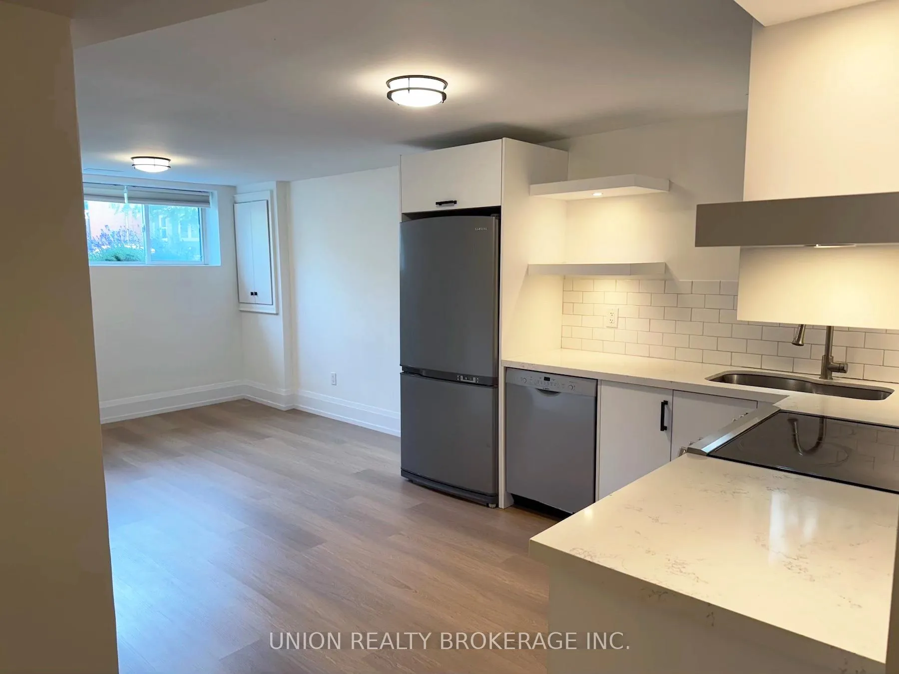 Photo 5 of Unit Lower, 22 Battenberg Avenue, Toronto, Woodbine Corridor — HOMEH