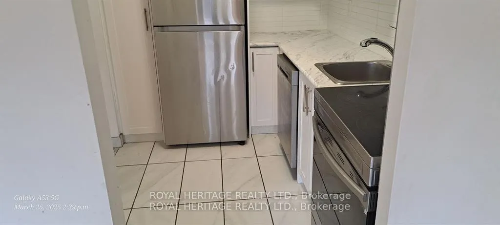 Photo 3 of Unit 101, 945 Simcoe Street N, Oshawa, Centennial — HOMEH