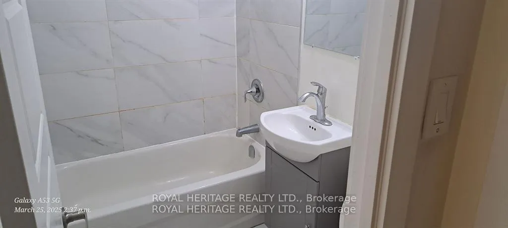 Photo 5 of Unit 101, 945 Simcoe Street N, Oshawa, Centennial — HOMEH