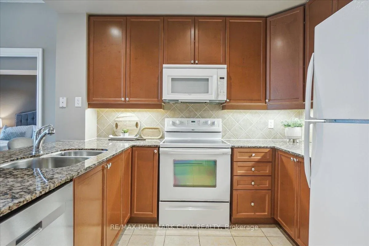Photo 13 of Unit 703, 33 Ellen Street, Barrie, Lakeshore — HOMEH