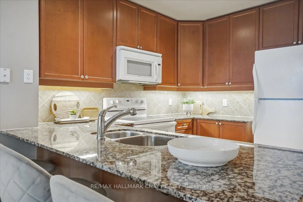 Photo 16 of Unit 703, 33 Ellen Street, Barrie, Lakeshore — HOMEH