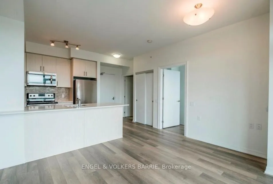 Photo 4 of Unit 704, 111 Worsley Street, Barrie, City Centre — HOMEH