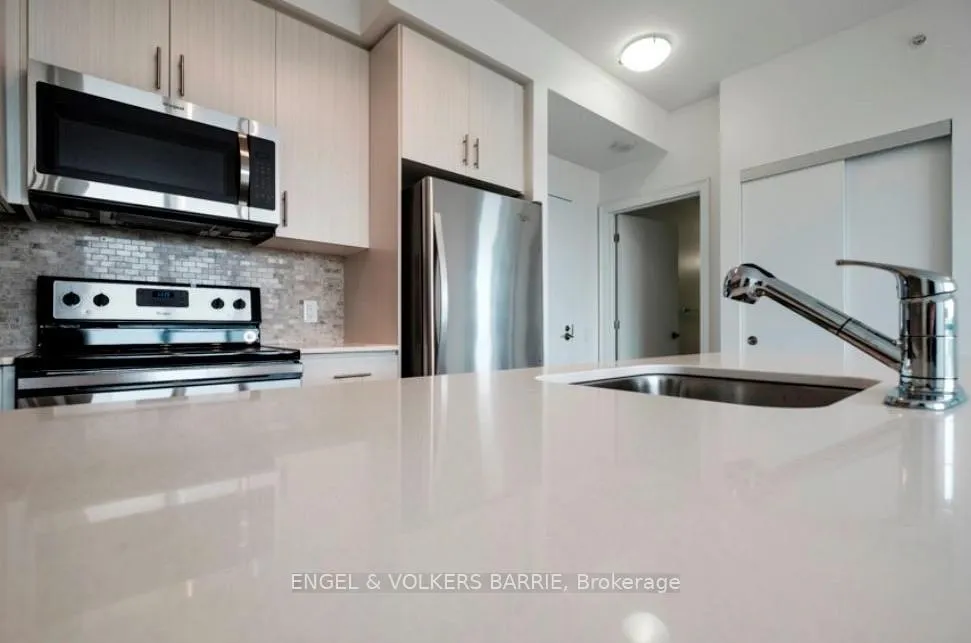 Photo 5 of Unit 704, 111 Worsley Street, Barrie, City Centre — HOMEH