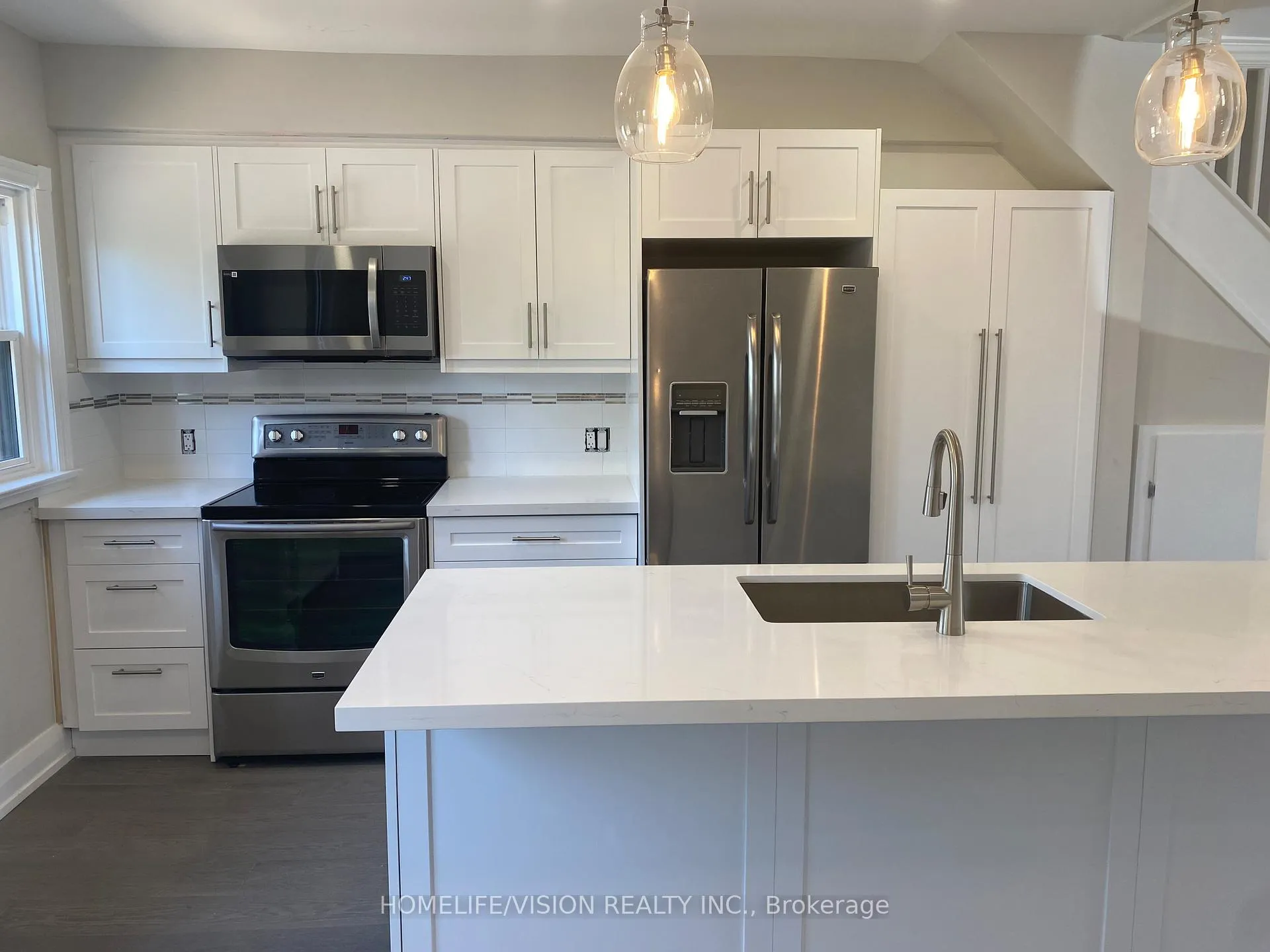 Photo 4 of Unit Upper, 2448 Gerrard Street E, Toronto, East End-Danforth — HOMEH
