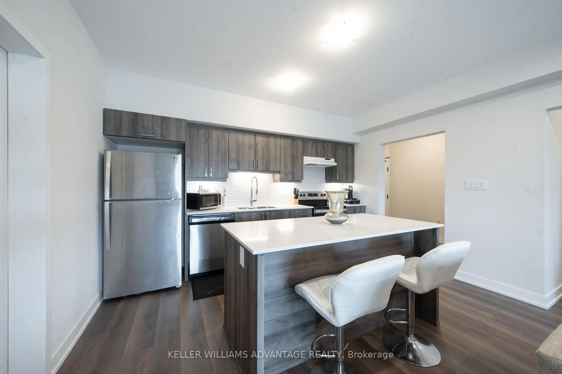 Photo 9 of Unit 104, 4 Spice Way, Barrie, Innis-Shore — HOMEH