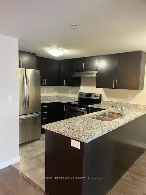 Photo 10 of Unit 411, 50 Bryan Court, Kitchener — HOMEH