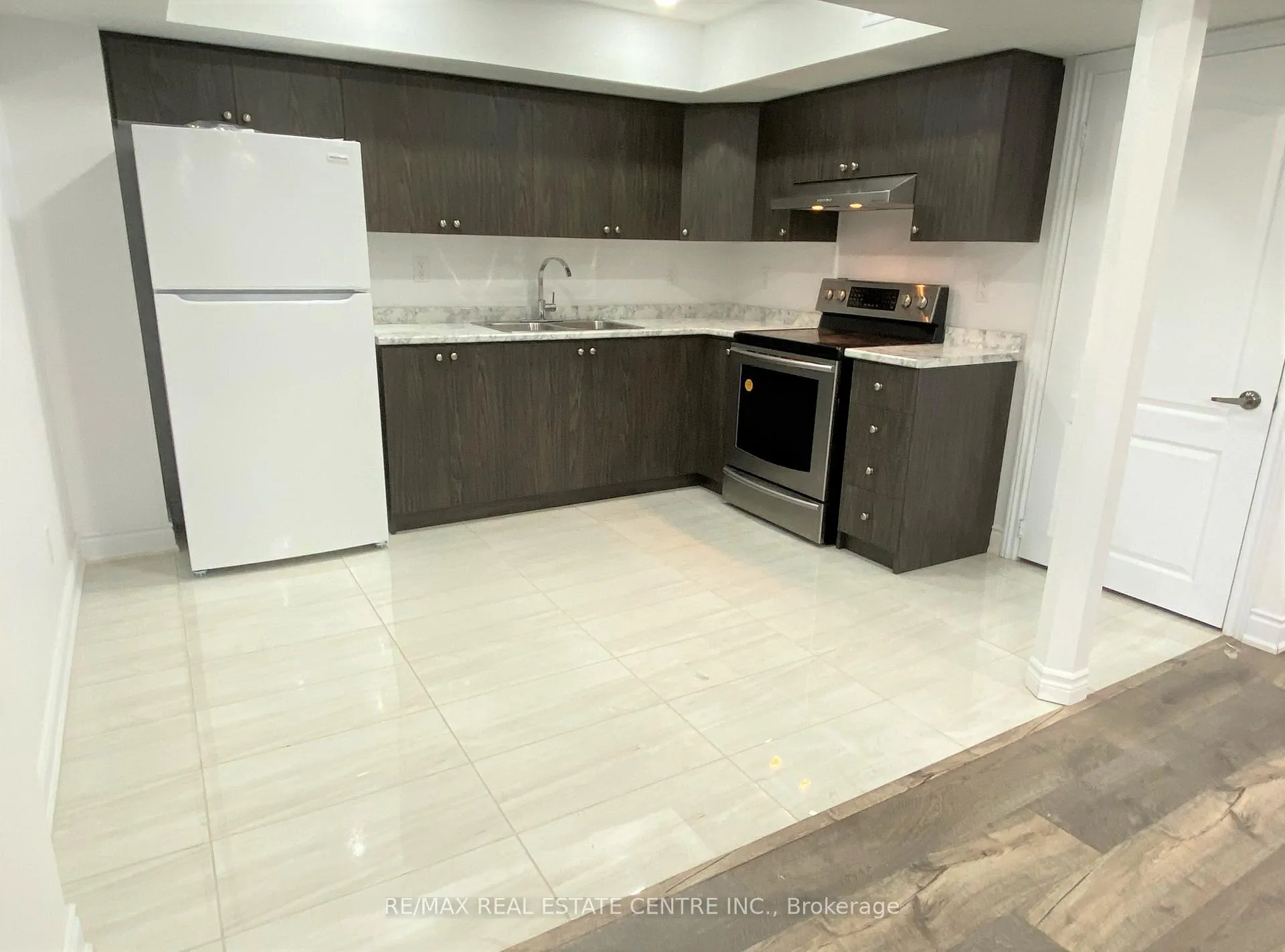 Photo 4 of Unit Lower, 44 Long Branch Trail, Brampton, Bram East — HOMEH