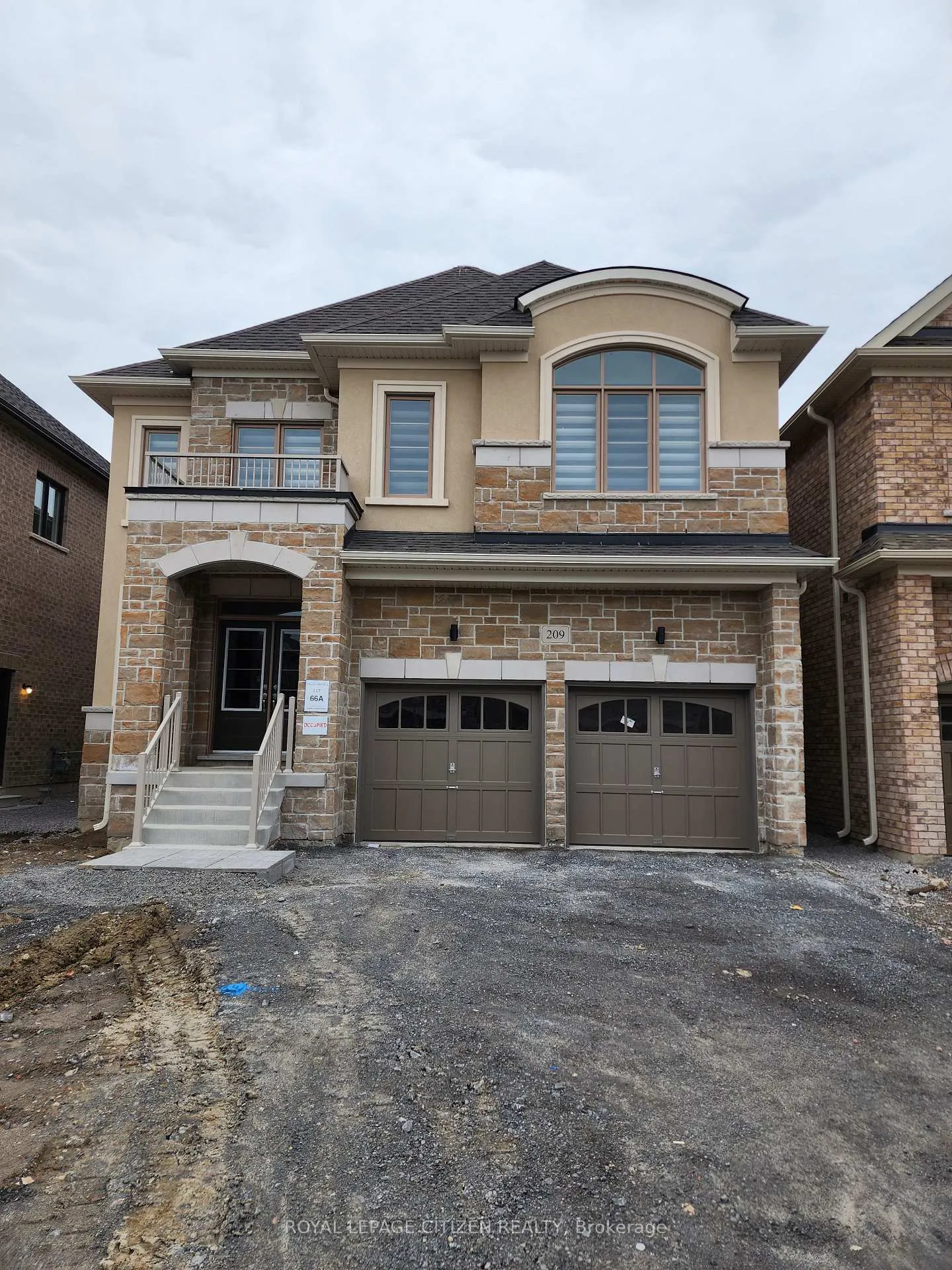 Front of 209 Ronald Guscott Street