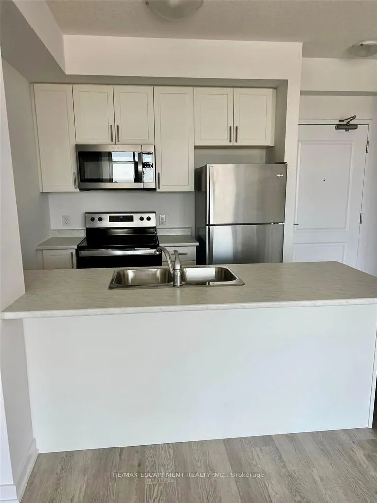 Photo 17 of Unit 703, 460 Dundas Street E, Hamilton, Waterdown — HOMEH
