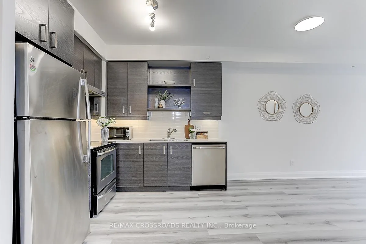 Photo 9 of Unit 310, 8228 Birchmount Road, Markham, Unionville — HOMEH