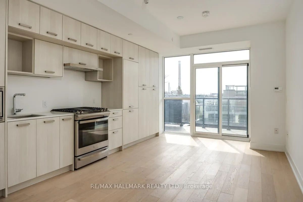 Photo 5 of Unit 406, 1331 Queen Street E, Toronto, South Riverdale — HOMEH