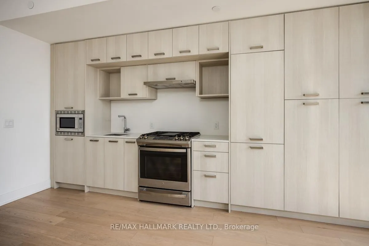 Photo 7 of Unit 406, 1331 Queen Street E, Toronto, South Riverdale — HOMEH