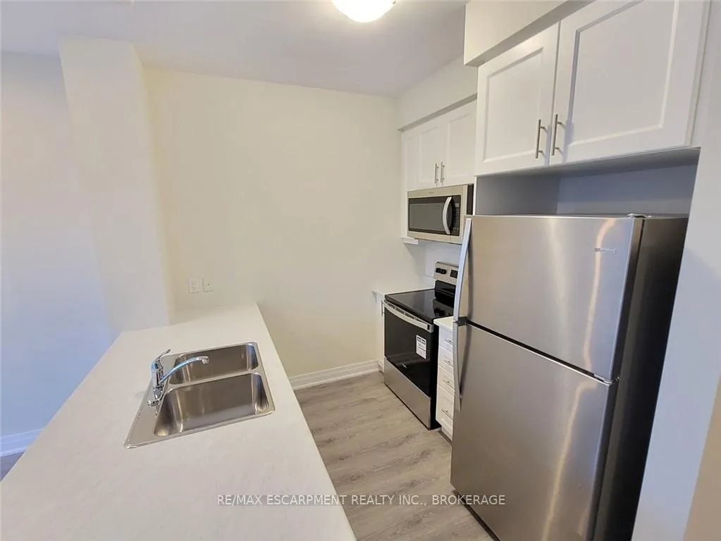 Photo 3 of Unit 546, 16 Concord Place, Grimsby, Grimsby Beach — HOMEH