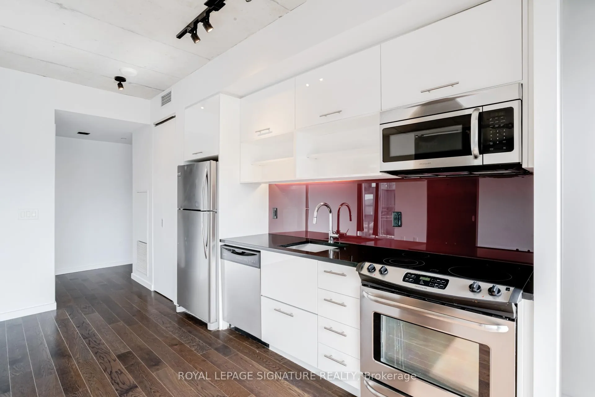 Photo 2 of Unit 718, 32 Trolley Crescent, Toronto, Moss Park — HOMEH