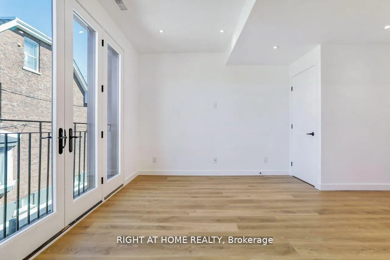 Photo 5 of Unit 202, 1086 St Clair Ave W, Toronto, Oakwood Village — HOMEH