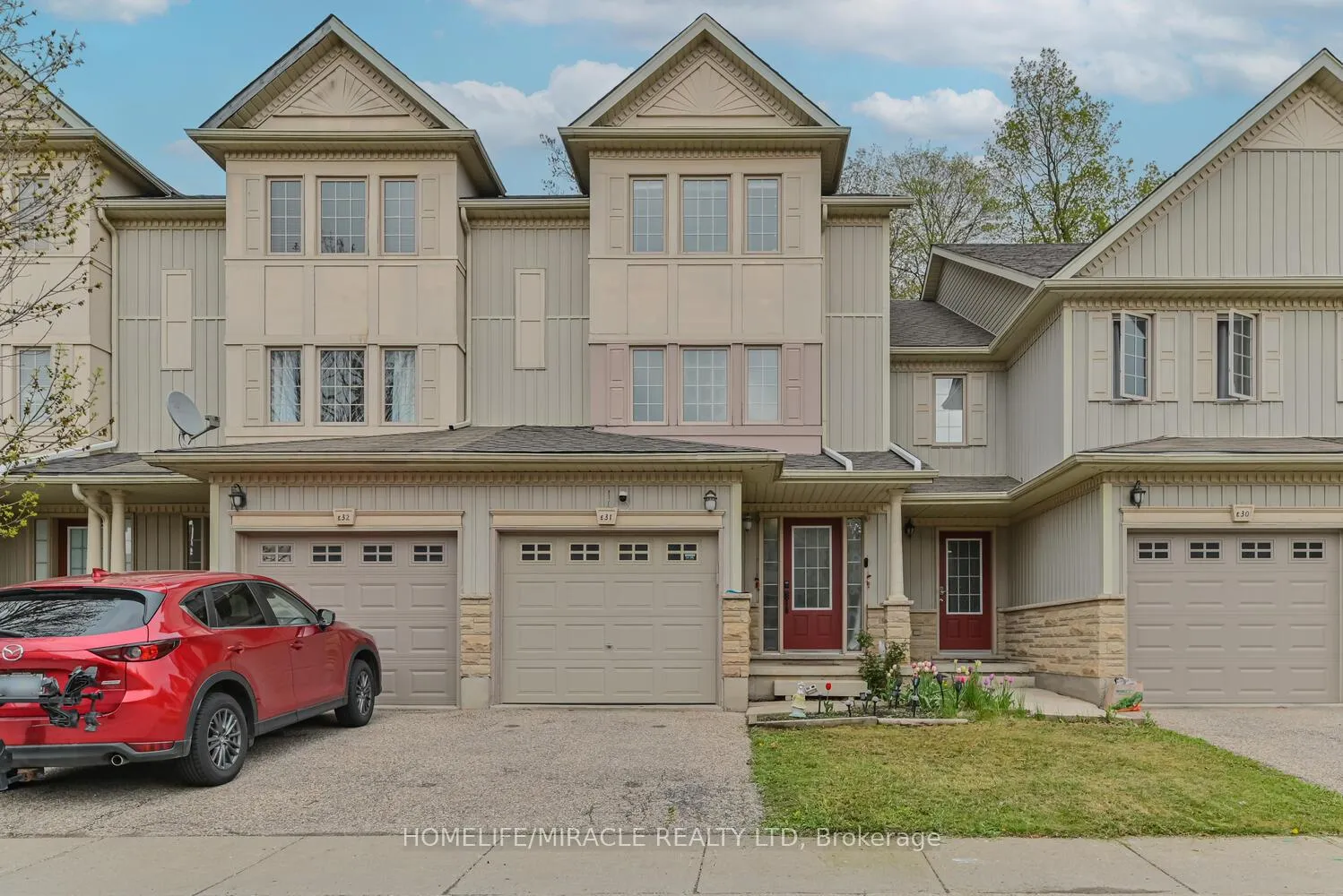 Front of Unit E-31, 110 Activa Avenue