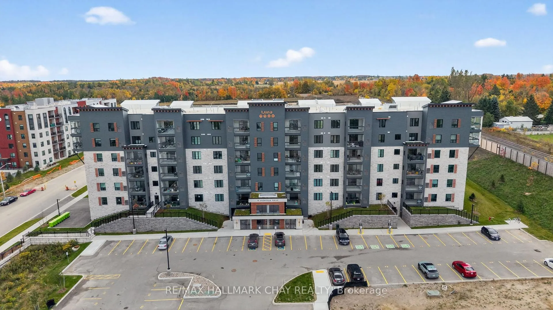 Photo 1 of Unit 203, 15 Kneeshaw Drive, Barrie, Innis-Shore — HOMEH