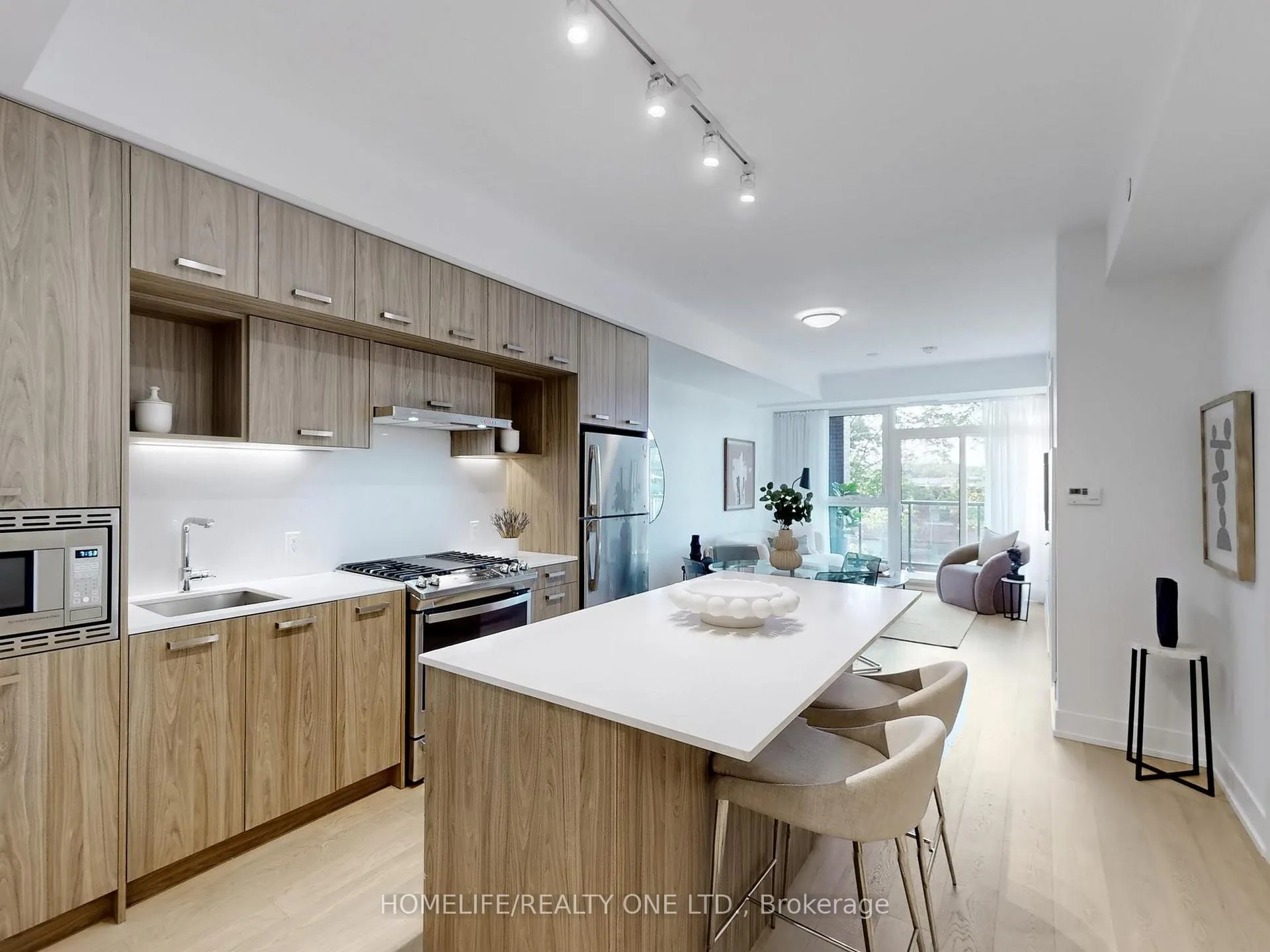 Photo 4 of Unit 402, 1331 Queen Street E, Toronto, South Riverdale — HOMEH
