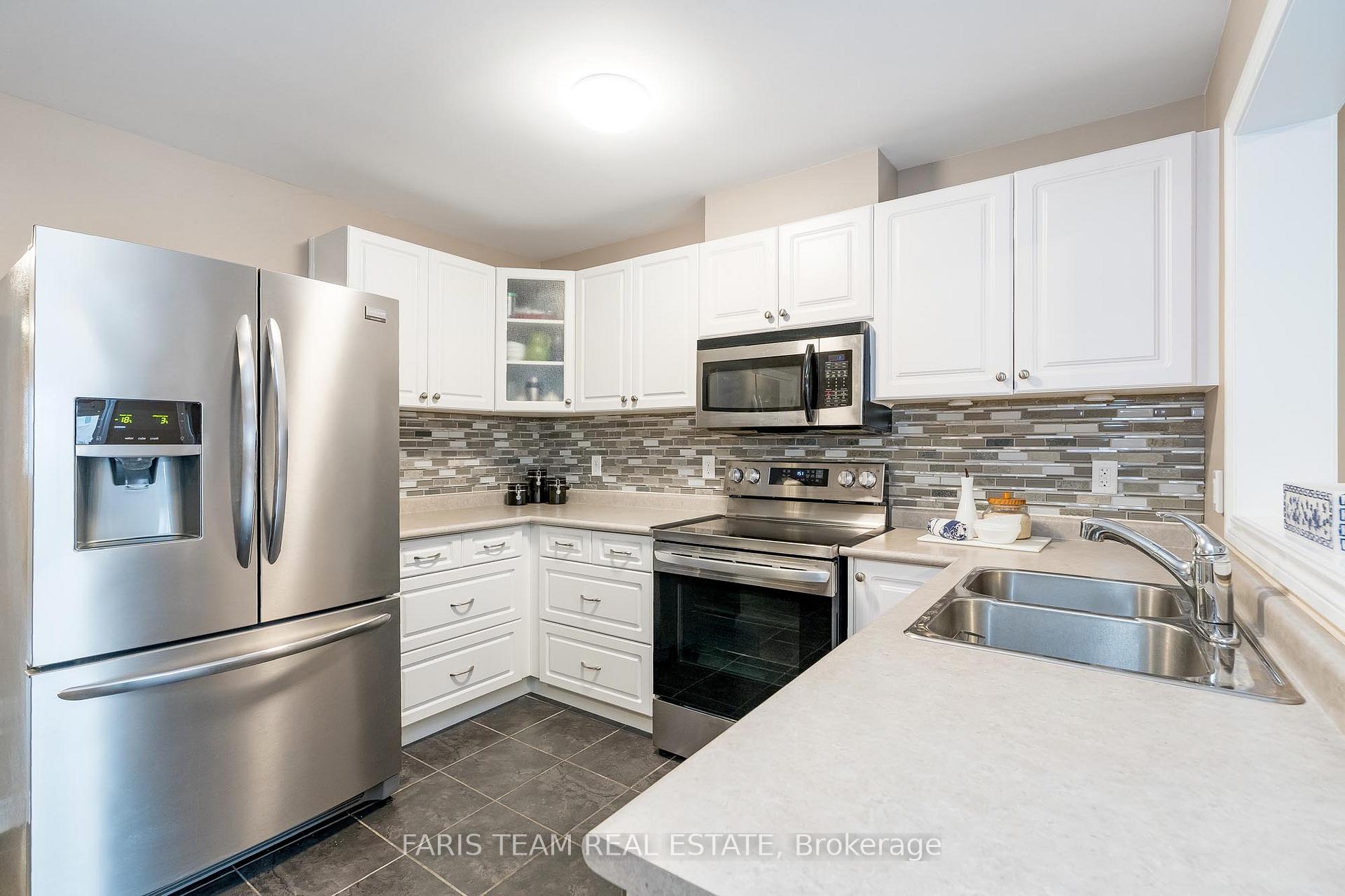 Photo 3 of 165 Banting Crescent, Essa, Angus — HOMEH