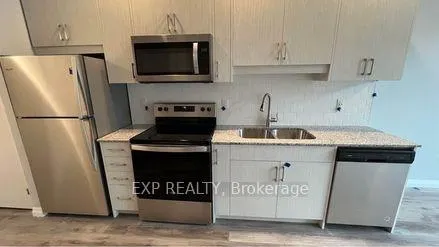 Photo 1 of Unit 202, 60 Charles St Street W, Kitchener — HOMEH