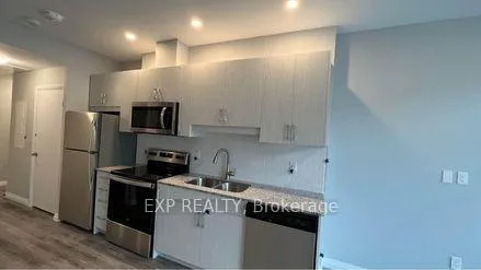 Photo 3 of Unit 202, 60 Charles St Street W, Kitchener — HOMEH